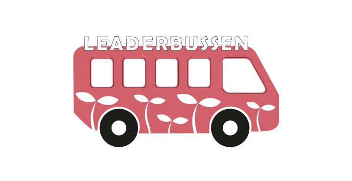 En bild på en rosa buss som det står Leaderbussen på.